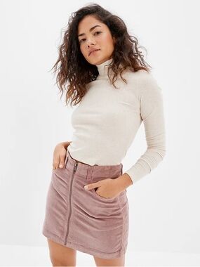 American Eagle Corduroy Mini Skirt with a front Zipper in the color Mauve.